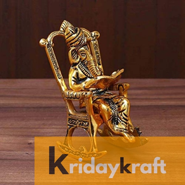 Lord Ganesha on Chair Reading Ramayan Metal Handicraft Figurine with Gold Plated