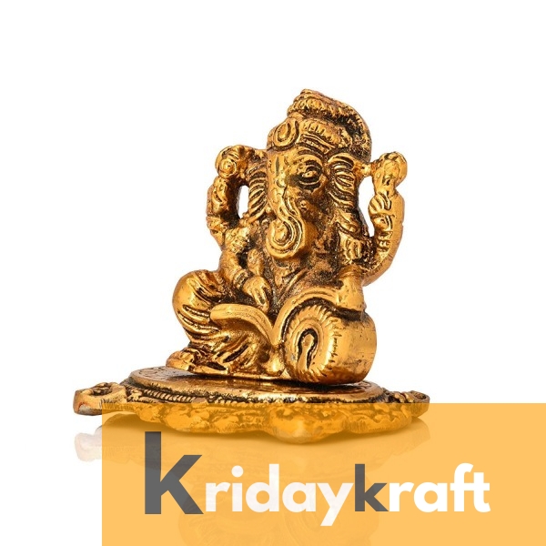 Ganesha sitting and reading book smal size gold plated for home decor and gifts