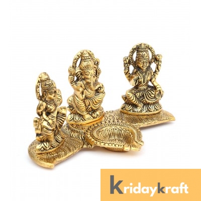 Metal laxmi Ganesh Saraswati Idol Decorative murti showpiece oil lamp diya gold plated 