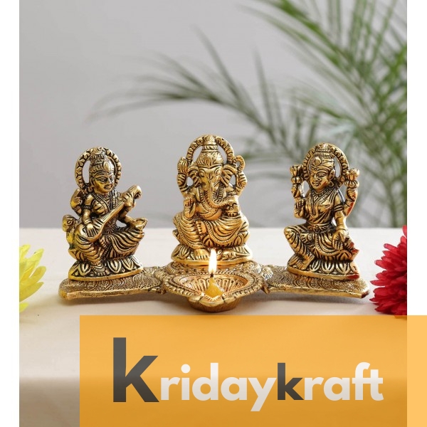 Metal laxmi Ganesh Saraswati Idol Decorative murti showpiece oil lamp diya gold plated 