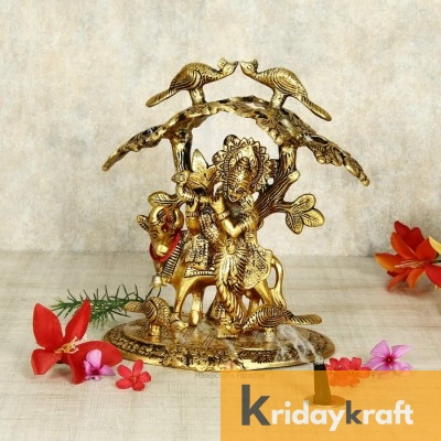Krishna with kamdhenu cow standing under tree and playing flute gold plated