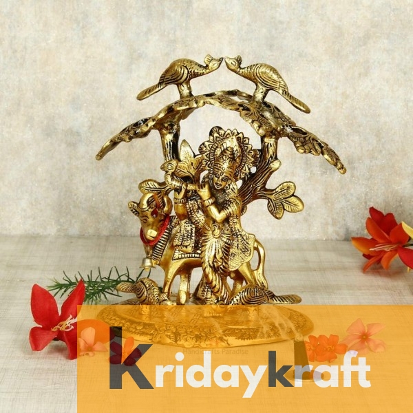 Krishna with kamdhenu cow standing under tree and playing flute gold plated