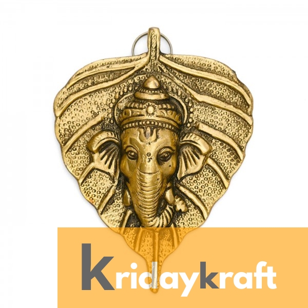 wall hanging ganesha face with leaf gold plated metal 